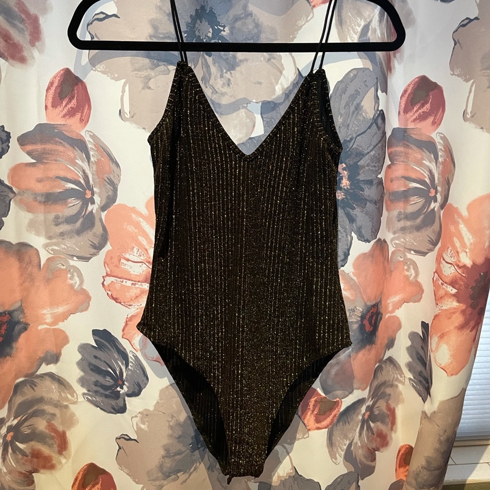 Gold and black bodysuit